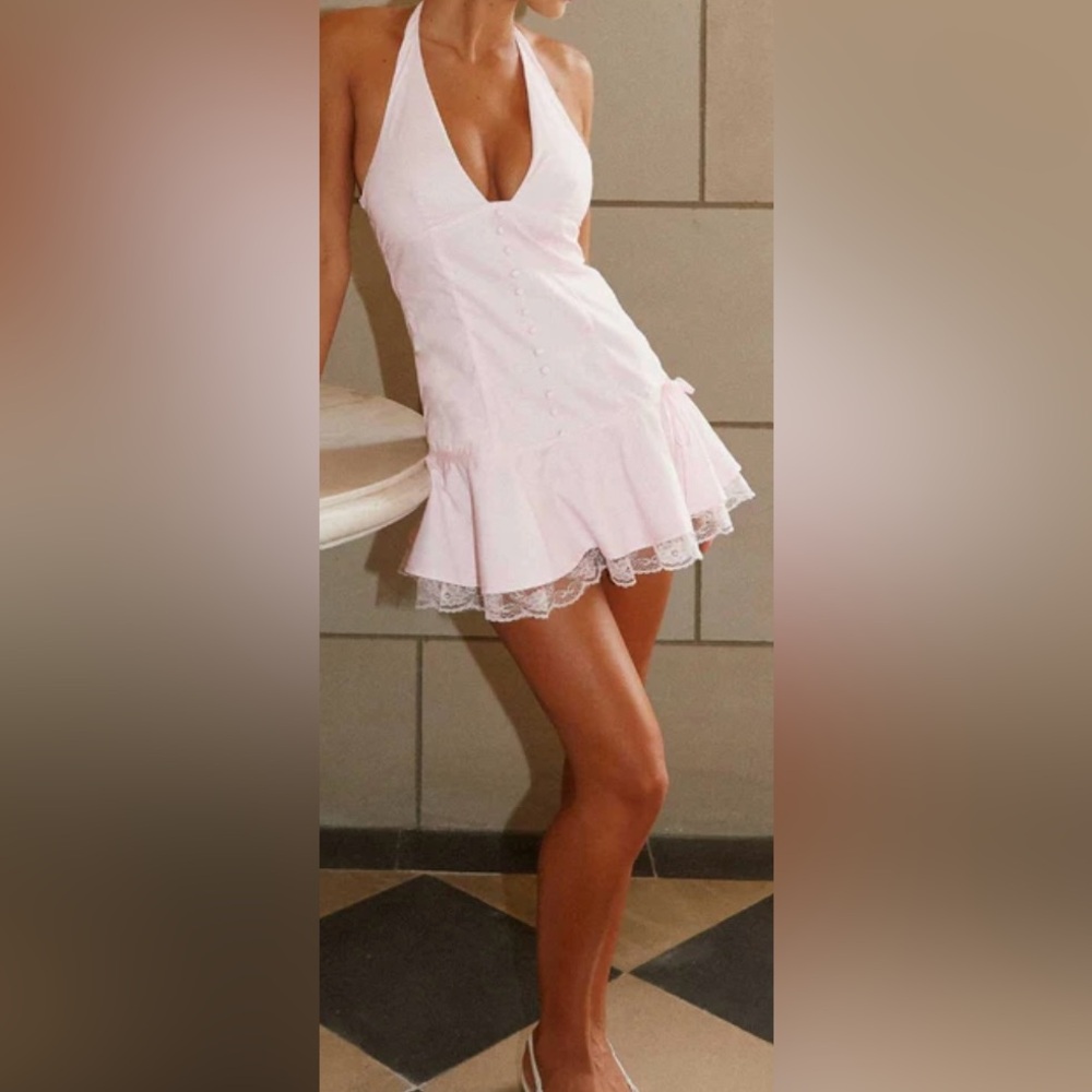 Pink Halter top mini dress w/lace detail at bottom & button closure at neckline.